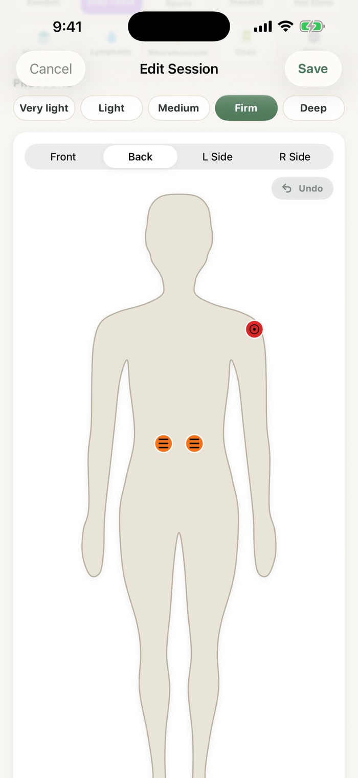 Knead session screen showing a back-view body chart with a red trigger point on the right shoulder and two orange tension marks on the lower back